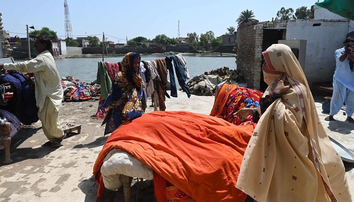 Pakistan floods wash away a family’s marriage hopes Mureed Hussain helps other family members to dry the dowry belongings of his daughter Nousheen, which was damaged by flood waters at his house in Fazilpur, Rajanpur district of Punjab province on September 3, 2022. — AFP