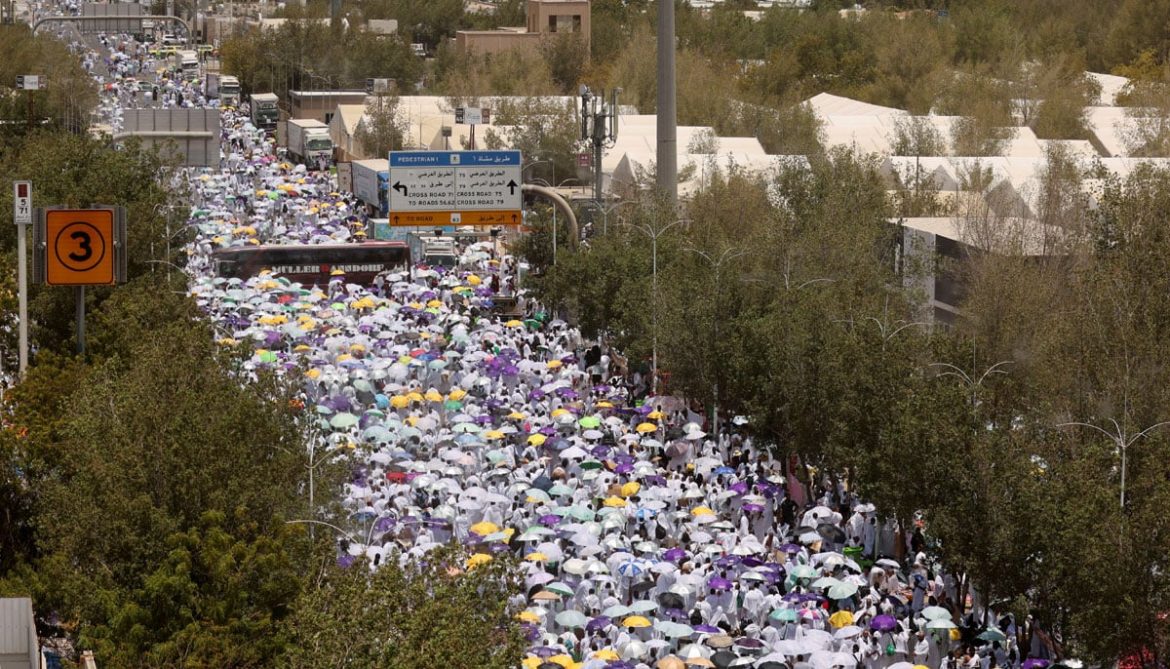 Pilgrims carry umbrellas amid high temperatures outside Namira Mosque on the plain of Arafat during the annual Hajj pilgrimage, outside the holy city of Makkah, Saudi Arabia, June 27, 2023. — Reuters