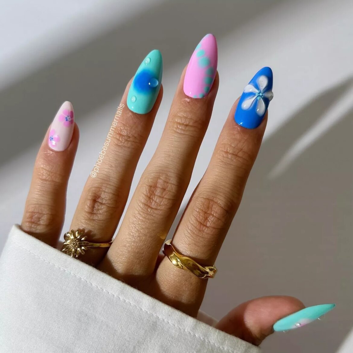 pink and blue nails with 3d flowers