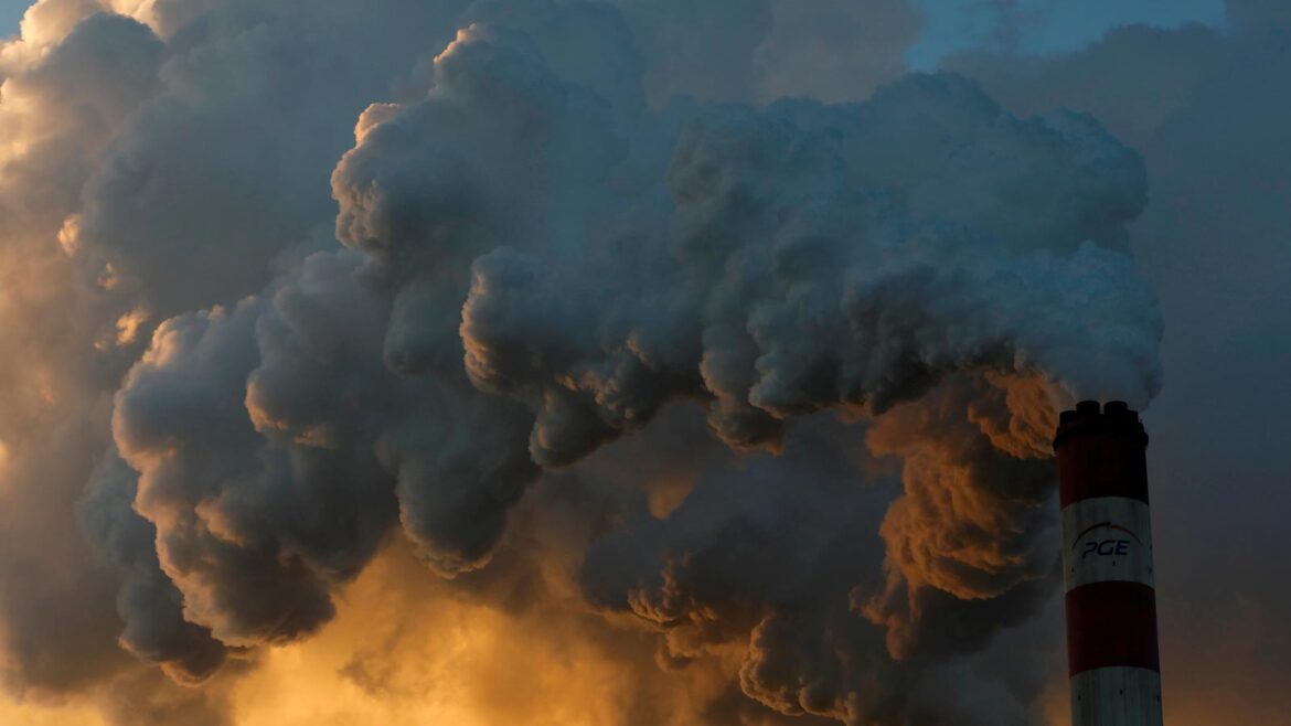 Smoke and steam billows from a power station. — Reuters