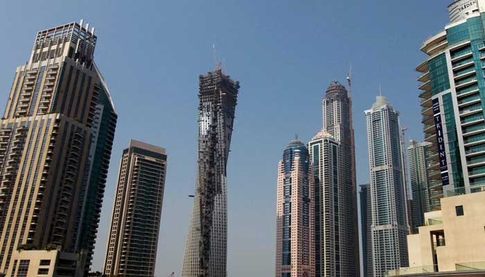 Dubai property transactions reach Rs1.45tr in a week Real estate property under construction is seen near the Dubai Marina, September 27, 2011. — Reuters