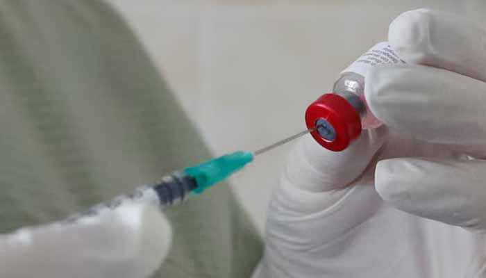 Ending polio still possible, health officials say, as funding cut A nurse fills a syringe with a vaccine before administering an injection at a kids clinic in Kiev, Ukraine August 14, 2019. — Reuters
