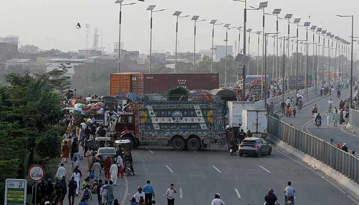 Govt declares TLP banned outfit under anti-terrorism act Trucks and containers block Ravi Bridge as supporters of Tehreek-e-Labbaik Pakistan (TLP) supporters march during a solidarity march for Gaza in Lahore, October 10, 2025. — Reuters