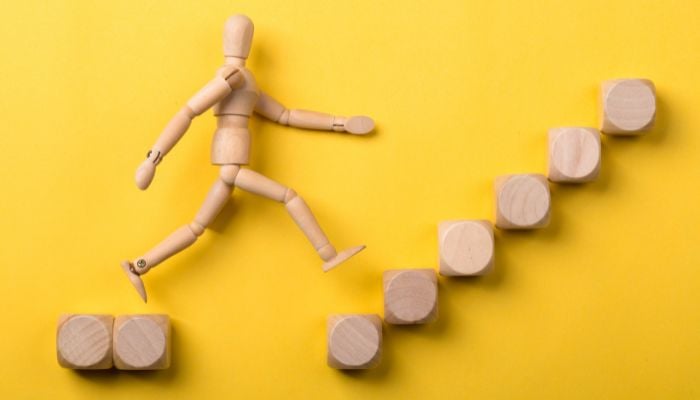 ‘How can I rediscover my passion and motivation in life?’ A representational image shows a figure walking up the stairs. — Canva