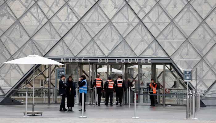 Louvre transfers jewels to Bank of France after heist Security employees enter the glass Pyramid of the Louvre Museum as the museum remains closed the day after a spectacular jewel heist by thieves,in Paris, France, October 20, 2025.— Reuters