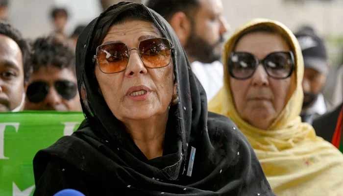 Non-bailable arrest warrant out for Aleema Khan, again Aleema Khan, sister of Imran Khan, speaks to the media after a court verdict outside the Islamabad High Court on June 3, 2024. — AFP