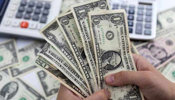 Pakistan secures $1.81bn in foreign loans in Q1FY26 A person counts dollar notes in this illustrative image taken on May 30, 2022. — Reuters