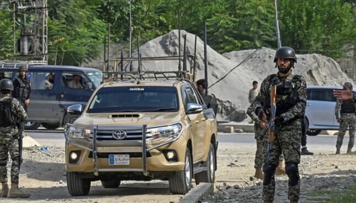 Pakistani troops foil infiltration from Afghanistan, 25 militants killed Security personnel stand guard in Bajaur district of Khyber Pakhtunkhwa. — AFP/File