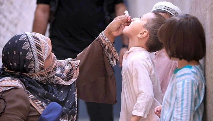 Pakistan’s 2025 polio tally reaches 30 as fresh case surfaces A female health worker administering polio drops to a child during the 7-day Pakistan Polio Eradication Programme 2024 in Peshawar on September 9, 2024. — APP
