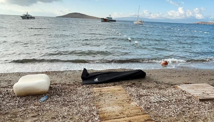 Seventeen dead as migrant boat capsizes in latest Aegean Sea A body bag lies on the shore as Coast Guard Command members conduct a search and rescue operation following the sinking of a migrant boat off Bodrum, western Mugla province, Turkey, October 24, 2025.— Reuters
