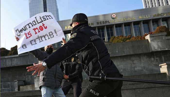 States, world leaders must act to end impunity for crimes Police officers restrain a protester during a rally of journalists against a new media bill, in front of the Parliament building in Baku, Azerbaijan, on December 28, 2021. — Reuters