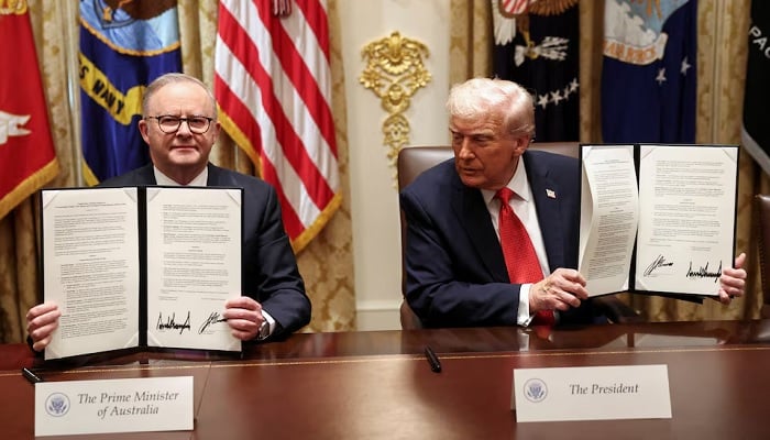 Trump, Australia’s Albanese sign critical minerals agreement to counter China US President Donald Trump and Australias Prime Minister Anthony Albanese hold a signed agreement on rare earth and critical minerals during a meeting with in the Cabinet Room at the White House, in Washington, DC, US, October 20, 2025. — Reuters