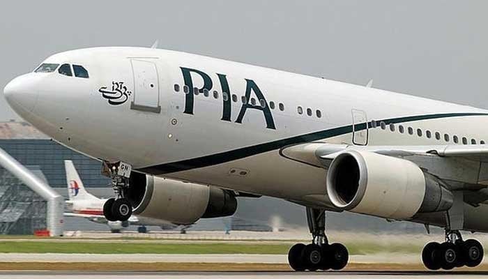 UK-bound PIA flights restart following long suspension A PIA aircraft is pictured up close on a runway just before takeoff. — AFP/File
