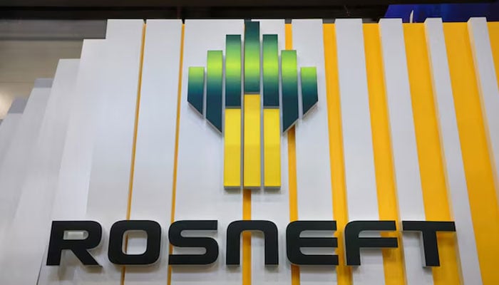 US hits top Russian oil companies with sanctions, EU bans A view shows a board with the logo of Russias oil producer Rosneft at the St Petersburg International Economic Forum (SPIEF) in Saint Petersburg, Russia, June 5, 2024. — Reuters