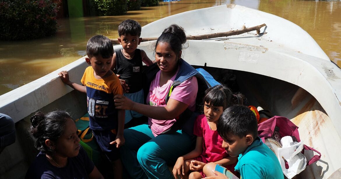 Women and children ride on a boat after being rescued from a flooded area, following Cyclone Ditwah in Kelaniya, Sri Lanka, November 30, 2025. — Reuters