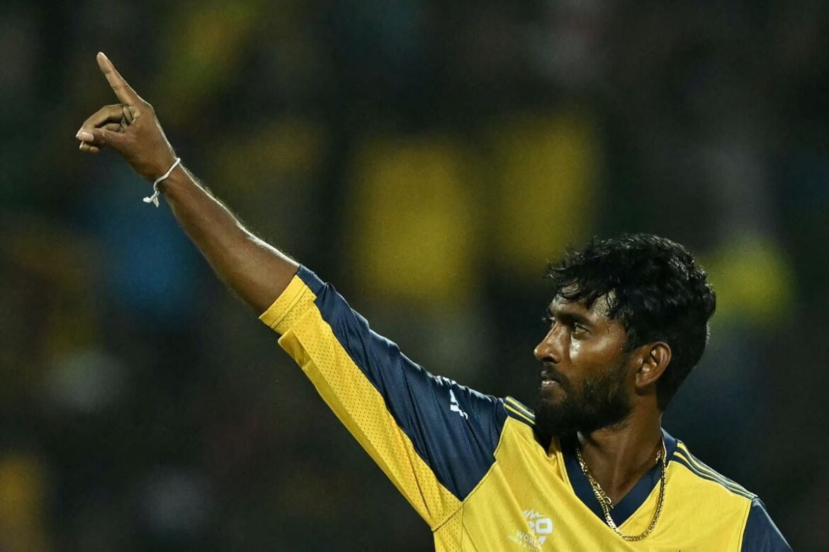 Sri lanka's Dushan Hemantha celebrates after taking the wicket of Australia's Travis Head during the 2026 ICC Men's T20 Cricket World Cup group stage match between Australia and Sri Lanka at Pallekele International Cricket Stadium in Kandy on February 16, 2026. PHOTO:AFP