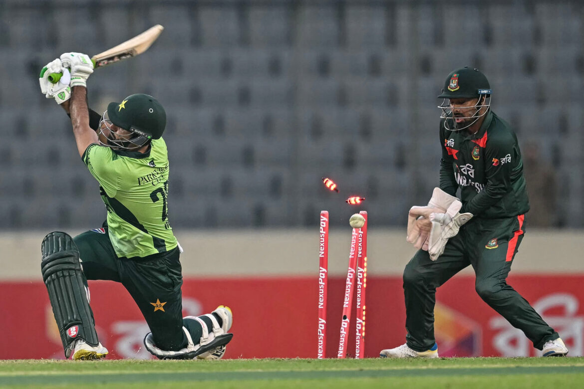 Pakistan's Hussain Talat (L) is clean bowled by Bangladesh's Rishad Hossain during the second one-day international (ODI) cricket match between Bangladesh and Pakistan at Sher-e-Bangla National Stadium in Mirpur on March 13, 2026. Photo: AFP
