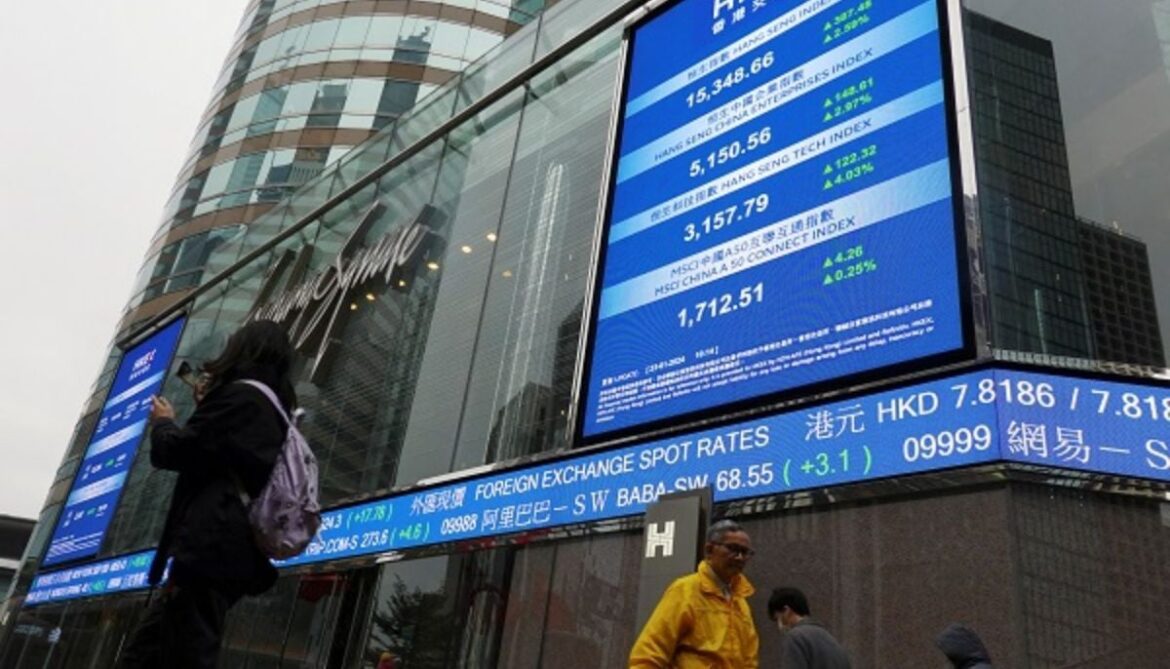 Asian stocks slide as oil prices surge amid Middle East ceasefire uncertainty