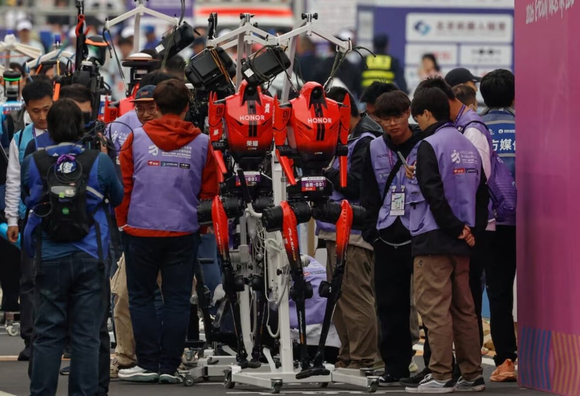 Humanoid robots by Honor are prepared ahead of the second Beijing E-Town Half Marathon and Humanoid Robot Half Marathon in Beijing, China April 19, 2026. REUTERS