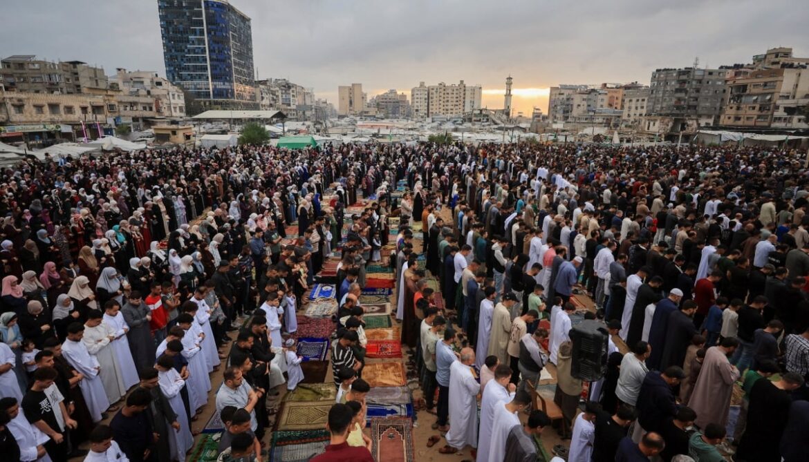Palestinian Muslims attend the Eid ul Adha prayer, in Gaza City, May 27, 2026. — Reuters