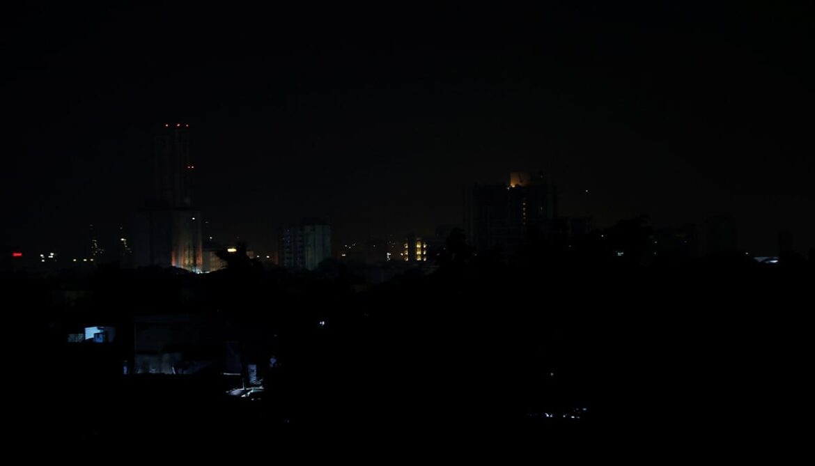A view shows buildings during a power breakdown in Karachi. — Reuters