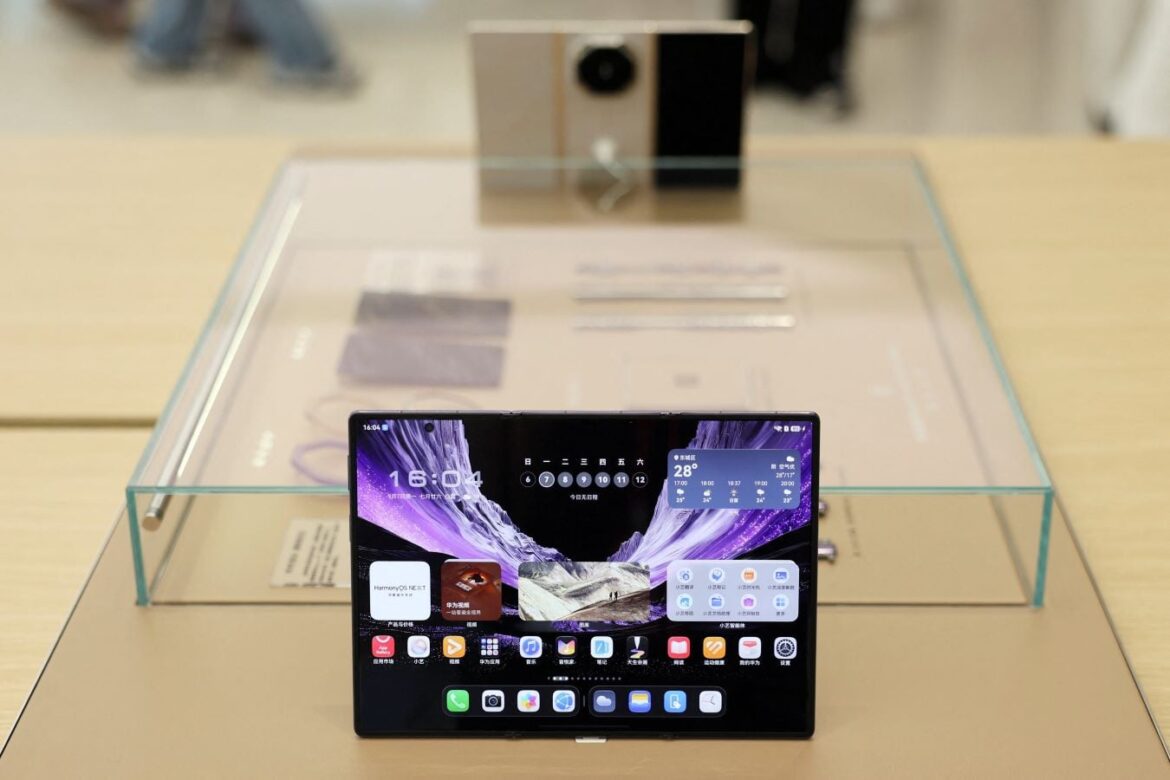 The HarmonyOS operating system running on a Huawei Mate XT2 foldable smartphone displayed at a Huawei store in Beijing, China September 7, 2026. REUTERS