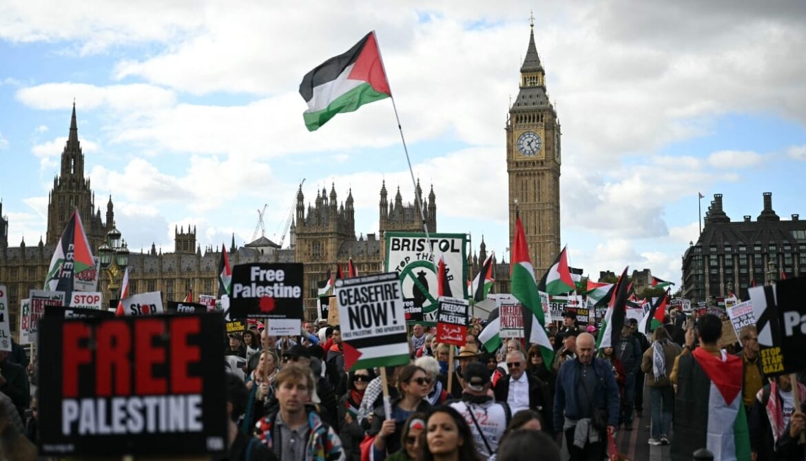 People cross Westminster Bridge as they take part in a National March in support of Palestine, organised by Palestine Solidarity Campaign, in central London on October 10, 2026. — AFP